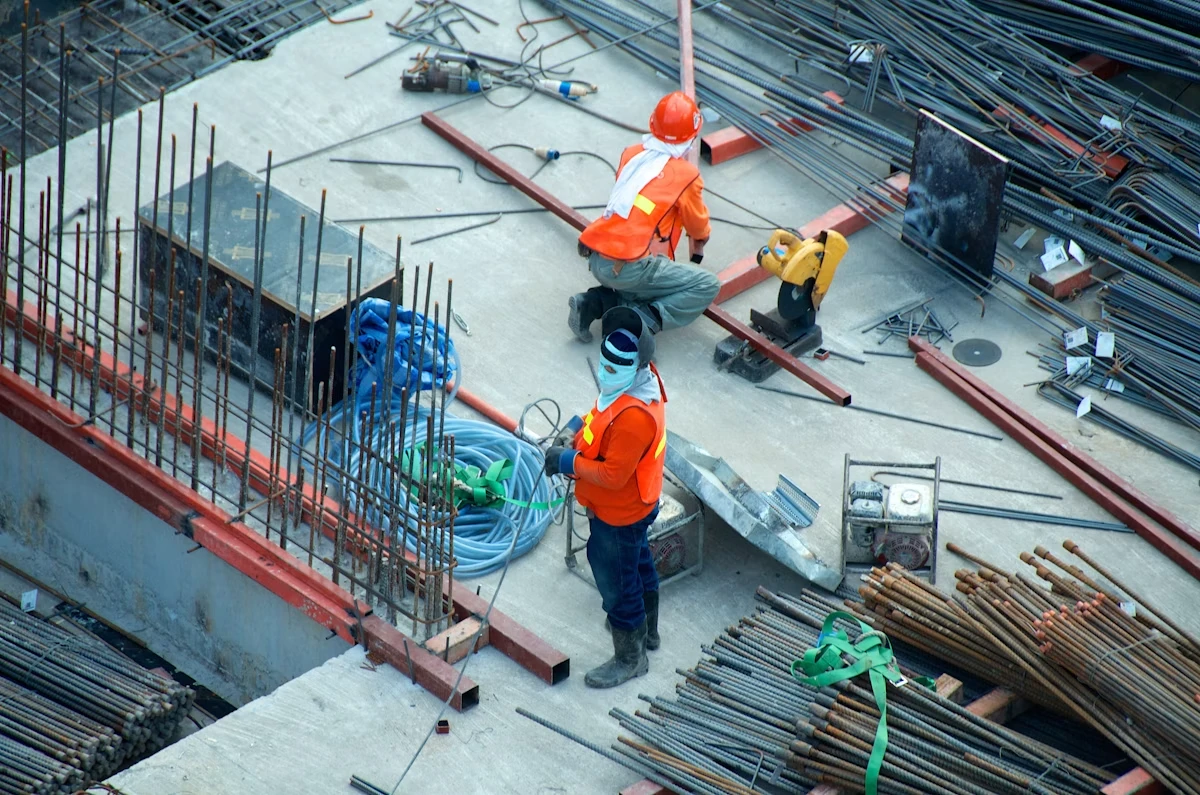 Construction professional inspecting exterior work